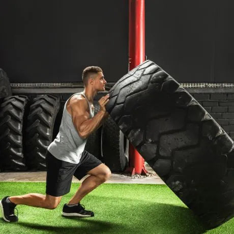 Building Strength Explained (With Rep Schemes And Exercises)